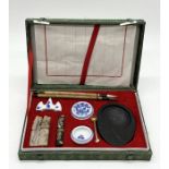 A cased Chinese ink set with accessories etc.