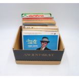 A quantity of 7" vinyl records consisting of mainly jazz and classical, including Frank Sinatra,
