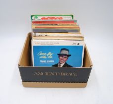 A quantity of 7" vinyl records consisting of mainly jazz and classical, including Frank Sinatra,