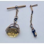 A swivel fob on part 18ct gold chain and T bar, along with another piece of 18t gold chain (approx
