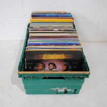 A large quantity of 12" vinyl records, including The Bee Gees, Elvis Presley, Glen Campbell, Frank