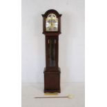 A chiming grandmother clock, with ornate brass dial with moon phase marked 'Richard Broad, Bodmin,