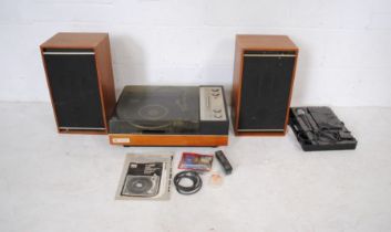 A vintage Pye Black Box BSR P128R (Model 1022) turntable with a pair of teak cased 8 ohm speakers