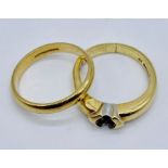 An 18ct gold wedding band along with a scrap 18ct gold ring- total weight 6.5g