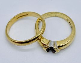 An 18ct gold wedding band along with a scrap 18ct gold ring- total weight 6.5g