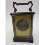 A brass carriage clock with silvered dial (out of position- see photographs)