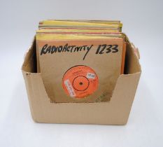 A collection of rock and pop 7" promotional/demonstration vinyl records, including Kraftwerk, Don