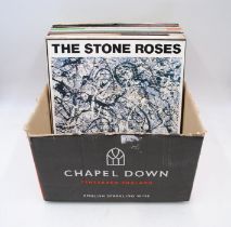 A quantity of 12" vinyl records, including The Stone Roses, The Undertones, Blondie, Squeeze, Roxy