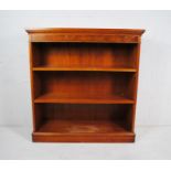 A mahogany freestanding bookcase- length 97cm, depth 32cm, height 101cm