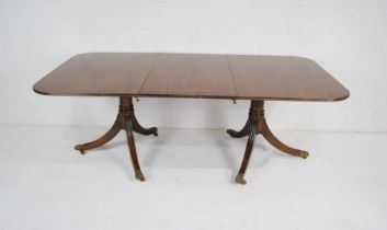 A Regency style mahogany extending dining table with one leaf - total length 203cm, depth 106cm,