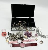 A collection of costume jewellery, watches etc.