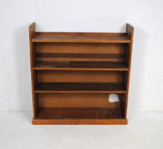 An oak freestanding bookcase - length 103.5cm, depth 30cm, height 109cm