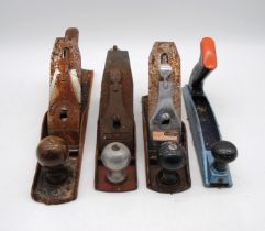 Four woodwork planes, including Macrome, Stanley Handyman, Millers Fall and Surform