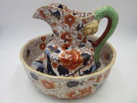 A reproduction Ironstone jug and bowl set in the Imari palette