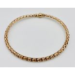 A 9ct gold bracelet by Milor, Italy of lightweight woven design, weight 2g