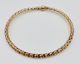 A 9ct gold bracelet by Milor, Italy of lightweight woven design, weight 2g