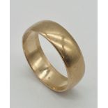 A 9ct gold wedding band, weight 6.1g