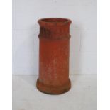 A terracotta chimney pot