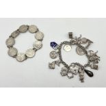 A silver charm bracelet along with a silver bracelet made from threepenny bits