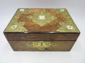 A Victorian walnut veneered box with brass decoration