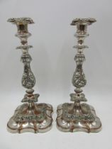 A pair of silver plated on copper candlesticks, height 34cm