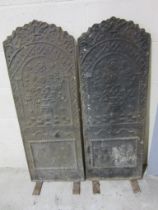 A pair of narrow antique cast iron fire backs both with initials DB and 51,each 107cm x 39cm