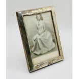 A silver photo frame, 15cm x 10cm