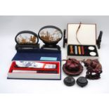A quantity of Oriental items, including two cork art pictures, a boxed fan, wax sealing kit, various