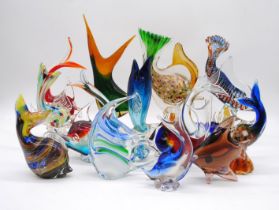 A collection of art glass fish, including Murano, Bohemia, Phoenician etc.