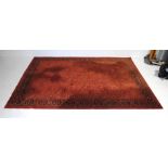 A red ground Eastern style rug - 11.5ft x 8.2ft