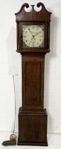 A turn of the century oak long case clock by W. Perry of Hockworthy with subsidiary second dial