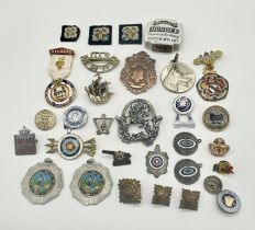 A collection of various badges, medallions etc. including Masonic, sports, military etc.