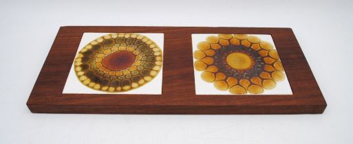 A mid century cheeseboard inset with two Alan Wallwork tiles - one cracked - length 5.5cm, depth