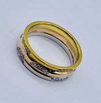 An 18ct tri colour gold wedding band set with diamonds (size G 1/2), weight 3.6g