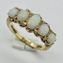 An opal 5 stone ring set in 9ct gold