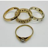 Two 9ct gold eternity rings along with a 9ct gold diamond solitaire with illusion setting and an