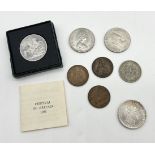 A small collection of coins including a replica 1835 Carlo Alberto 5 Lire