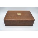 An oak Walker and Hall cutlery box, with brass plaque named to 'Mr W. F. Gilbertson' of 'Ynisderw