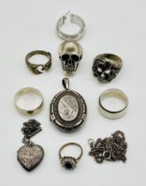 A collection of 925 silver jewellery, lockets, rings etc.