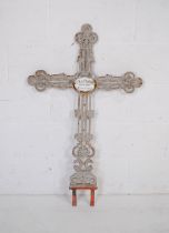 A French cast iron cross, with enamel plaque reading 'Sr M. du St Espirit, 1854 - 1920, 34 ans de