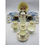 A Wedgwood part coffee set along with an Adderley set, Limoges trios and an Aynsley Orchard Gold