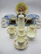 A Wedgwood part coffee set along with an Adderley set, Limoges trios and an Aynsley Orchard Gold