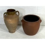 A terracotta crock pot by C.H. Brannam Ltd (small chip to handle and lid) plus a part glazed urn (