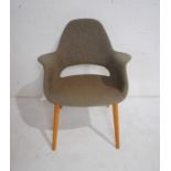 A mid century style upholstered office chair