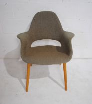 A mid century style upholstered office chair