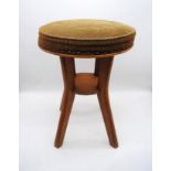 A mid century four legged stool