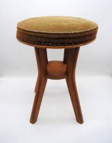 A mid century four legged stool