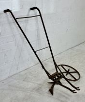 A vintage cast iron plough