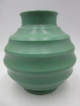 A Wedgwood Pottery vase designed by Keith Murray, ribbed, ovoid form, covered in a matt green glaze,