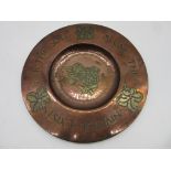 A hammered copper plate "For the soul alone the universe exists" diameter 32cm